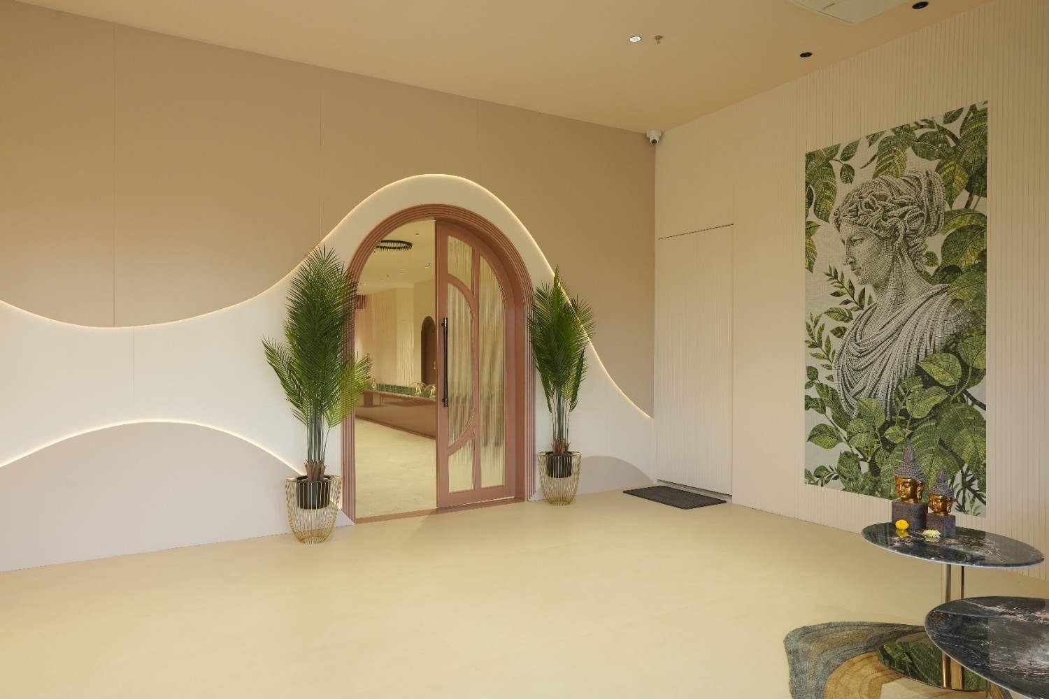 Grand reception sanctuary with plaster alcoves and warm lighting